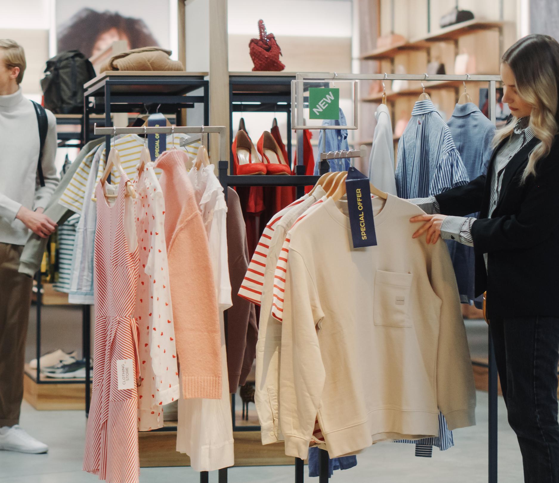 woman looking at clothes